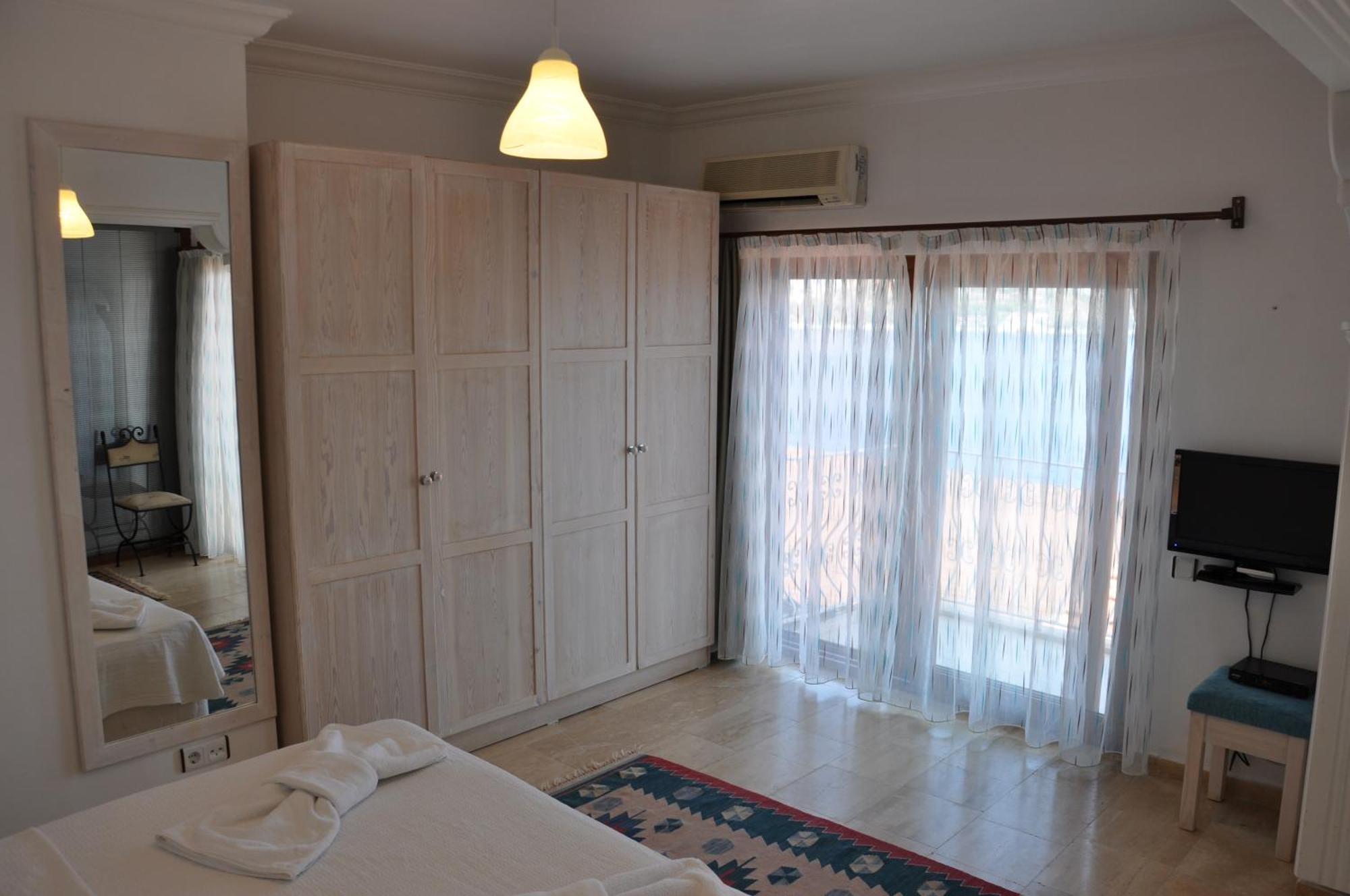 Caretta Hotel Калкан Стая снимка