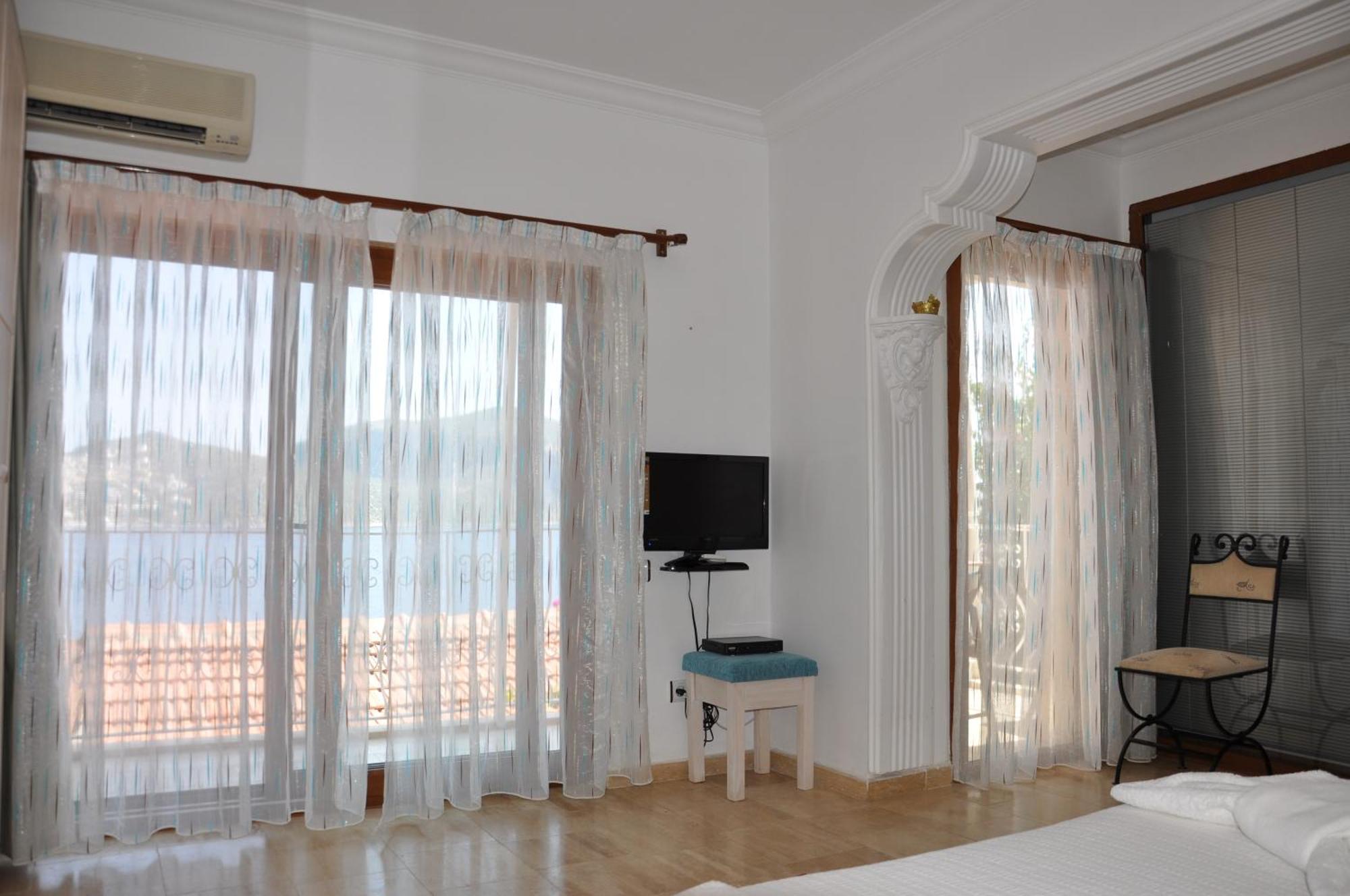 Caretta Hotel Калкан Стая снимка